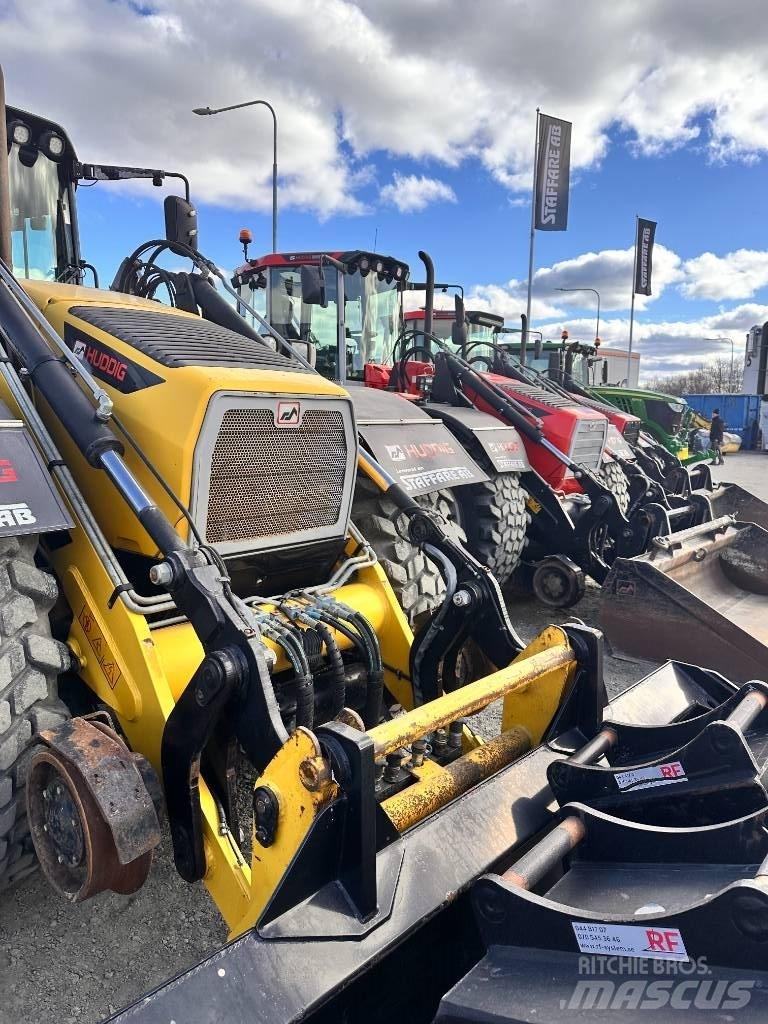 Huddig 1260 C Экскаваторы-погрузчики
