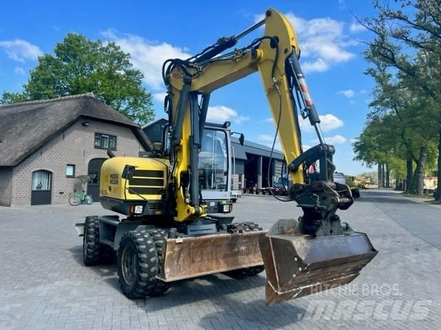 Neuson 9503 Колёсные экскаваторы
