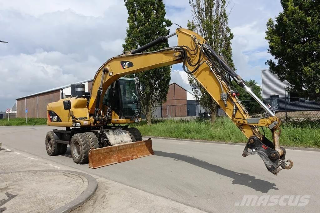 CAT M313 D Колёсные экскаваторы