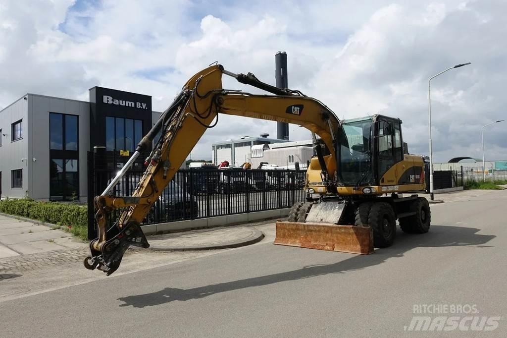 CAT M313 D Колёсные экскаваторы