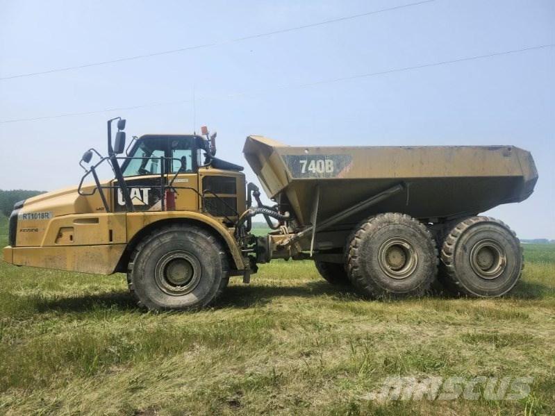 CAT 740 B Шарнирно-сочленённые самосвалы