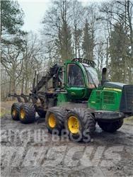 John Deere 1110 E Форвардеры