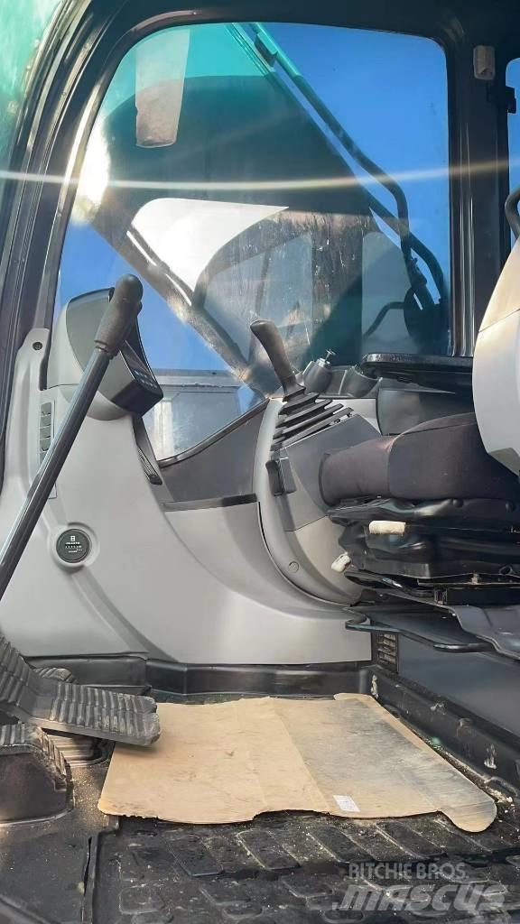 Kobelco SK 200 Гусеничные экскаваторы