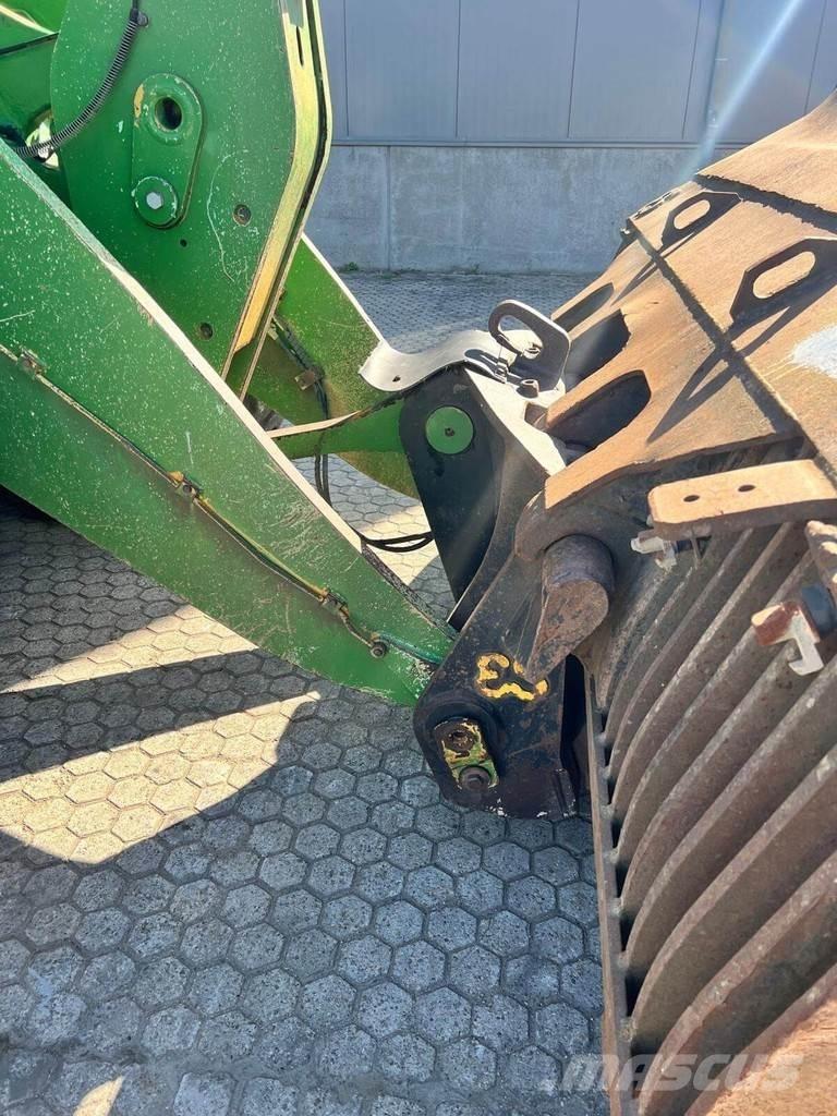 CAT 950M Фронтальные погрузчики