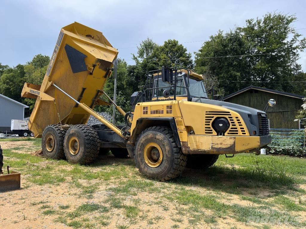 Komatsu HM 400 Шарнирно-сочленённые самосвалы