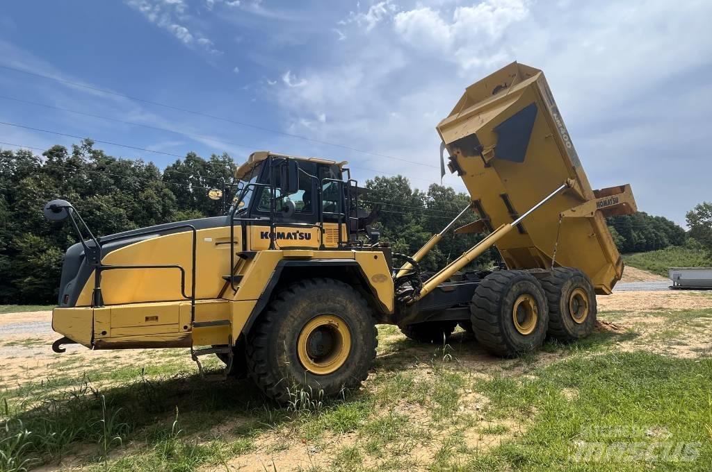 Komatsu HM 400 Шарнирно-сочленённые самосвалы