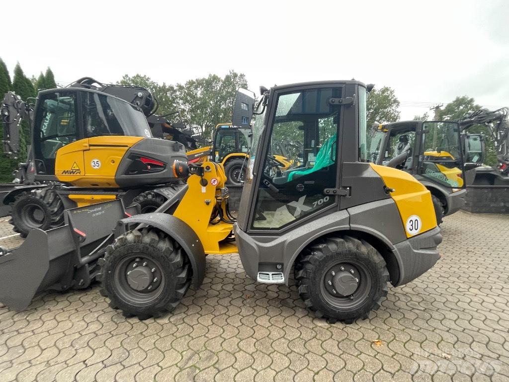 Mecalac AX700 Фронтальные погрузчики