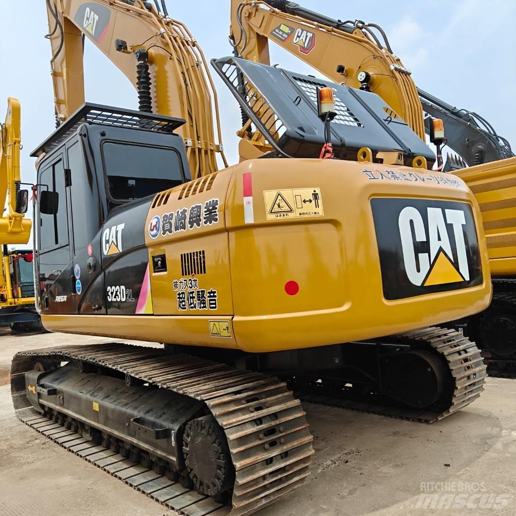 CAT 323 D L Гусеничные экскаваторы