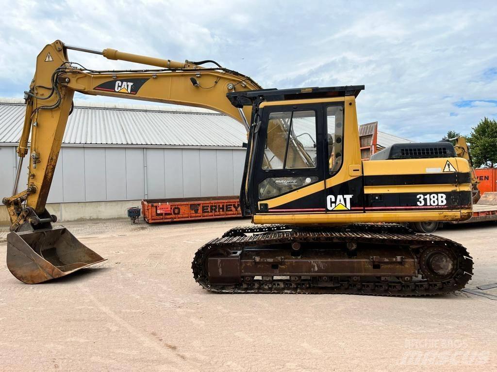 CAT 318BL Гусеничные экскаваторы