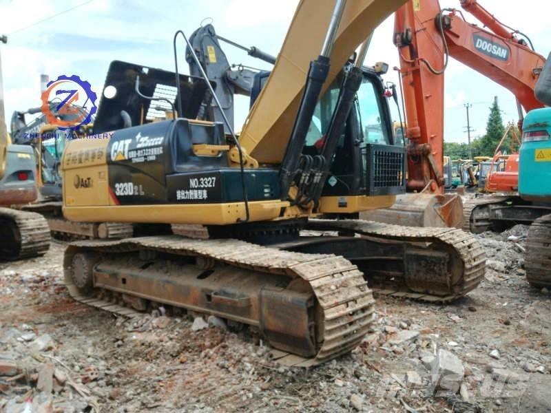 CAT 323 D L Гусеничные экскаваторы