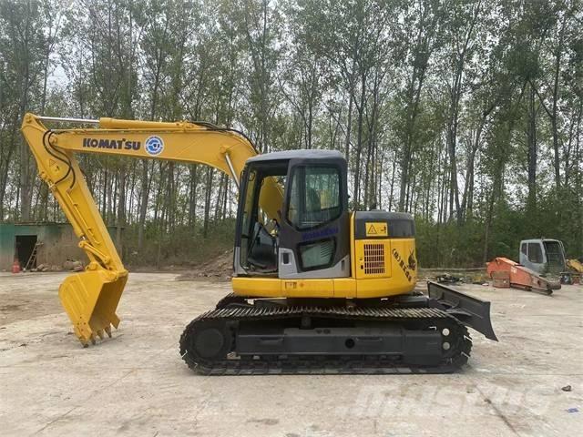 Komatsu PC128US Гусеничные экскаваторы