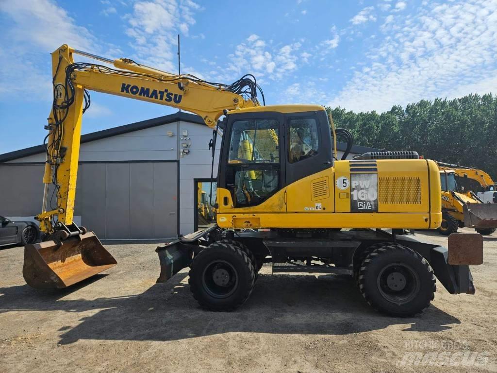 Komatsu PW 160-7 Колёсные экскаваторы