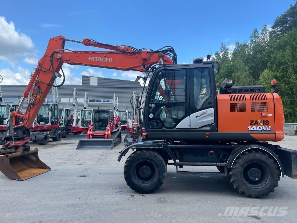 Hitachi 140W Колёсные экскаваторы