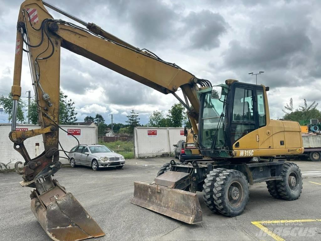 CAT 315 C Колёсные экскаваторы