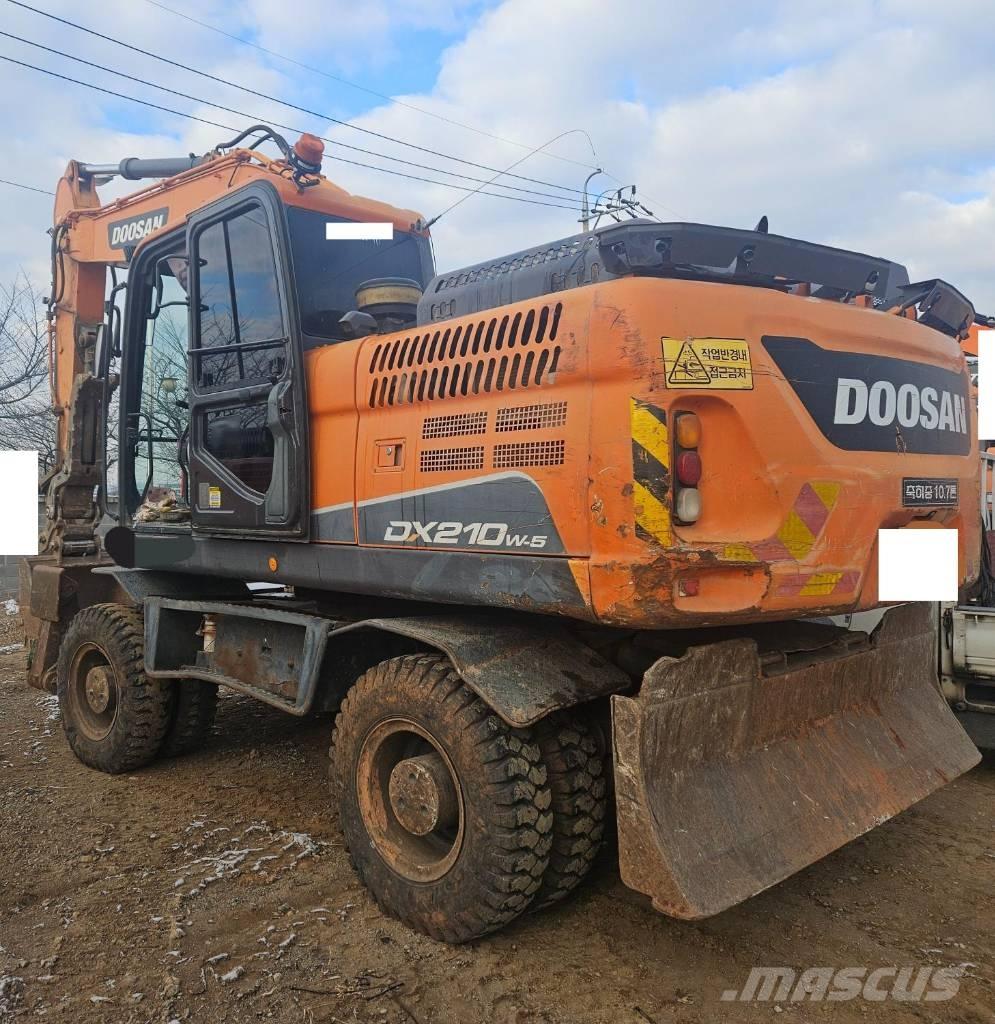Doosan DX210WA Колёсные экскаваторы