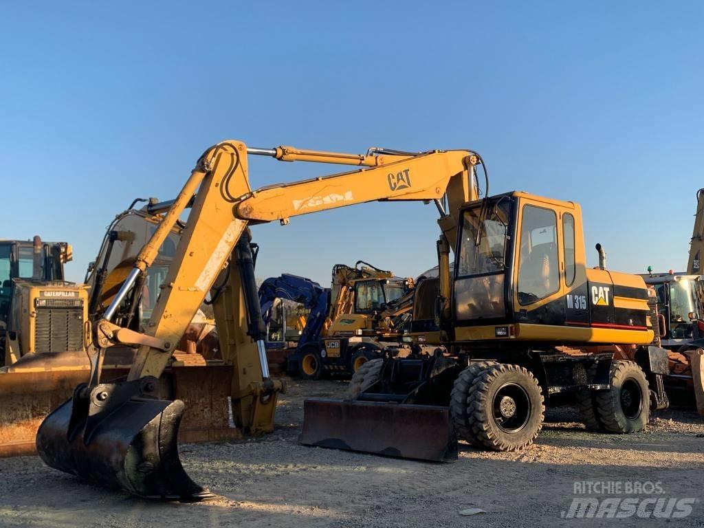 CAT M 315 Колёсные экскаваторы