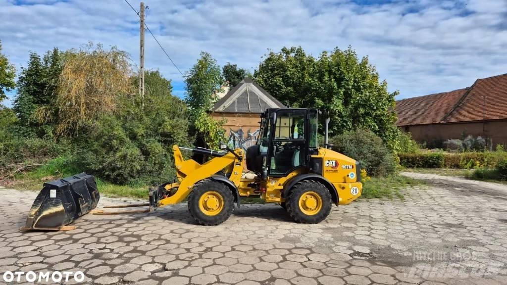 CAT 906 Фронтальные погрузчики