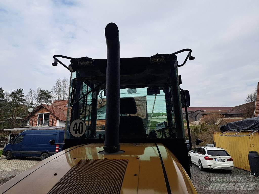CAT 910 Фронтальные погрузчики