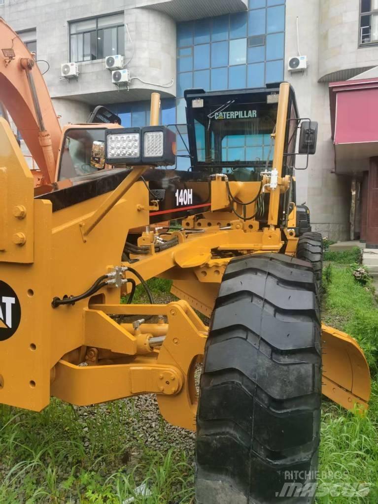 CAT 140 H Экскаваторы-погрузчики