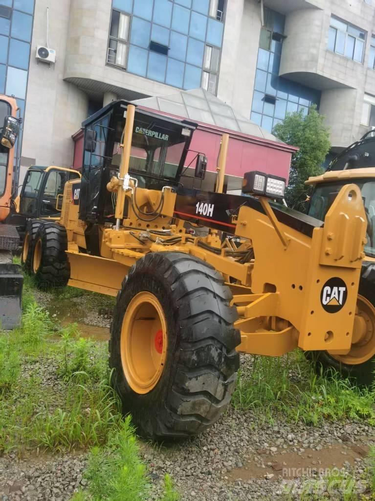 CAT 140 H Экскаваторы-погрузчики
