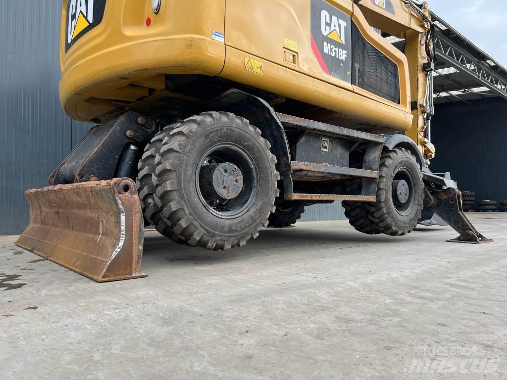 CAT M318F Колёсные экскаваторы