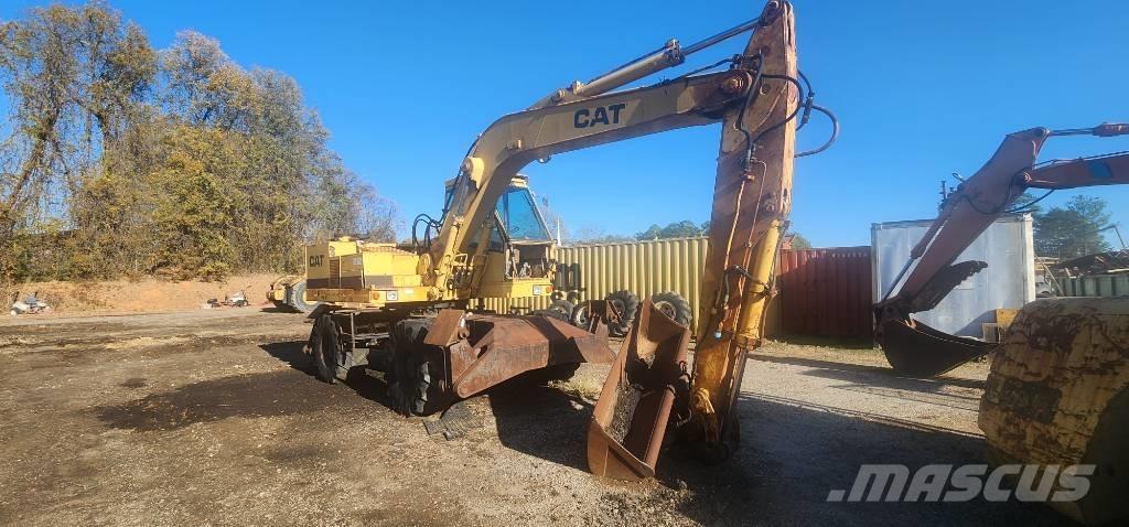 CAT 212 Колёсные экскаваторы