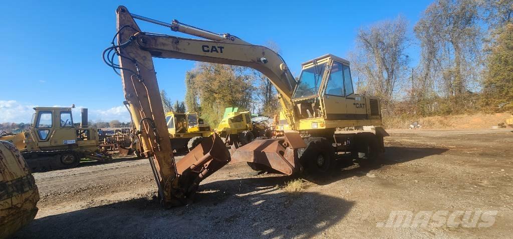 CAT 212 Колёсные экскаваторы