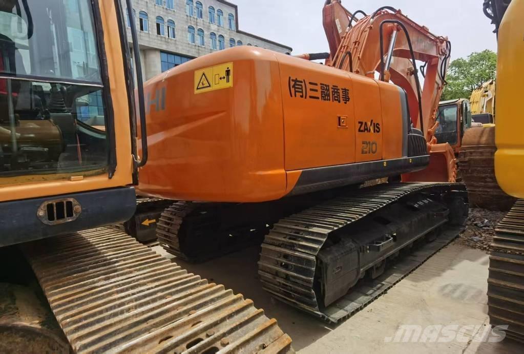 Hitachi ZX 210 Гусеничные экскаваторы