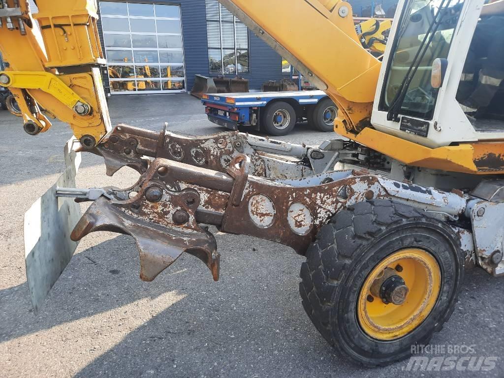 Menzi Muck M525 Колёсные экскаваторы