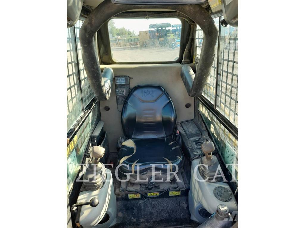 CAT 247B3 Гусеничные фронтальные погрузчики