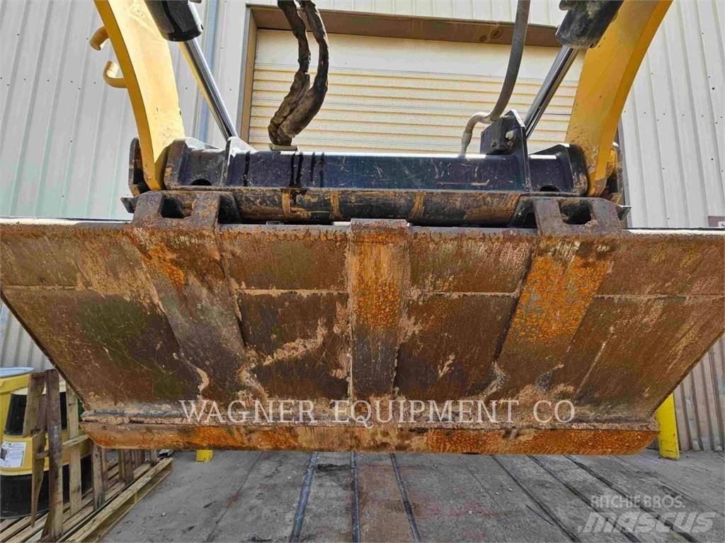 CAT 259D3 Гусеничные фронтальные погрузчики