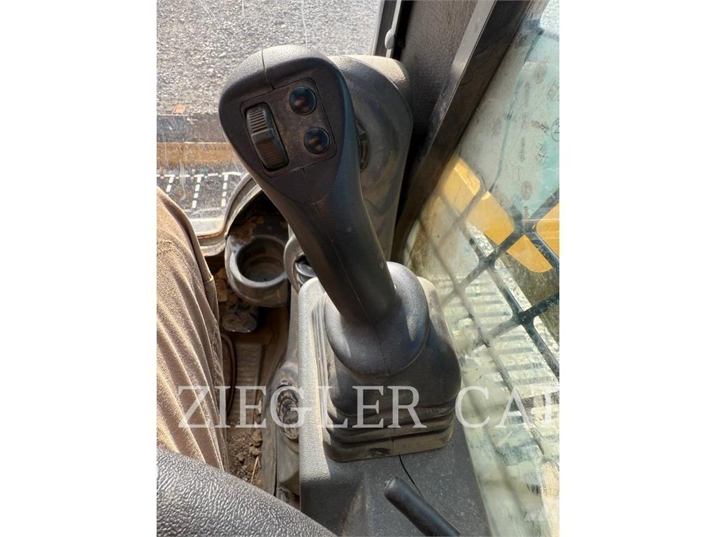 CAT 259D3 Гусеничные фронтальные погрузчики