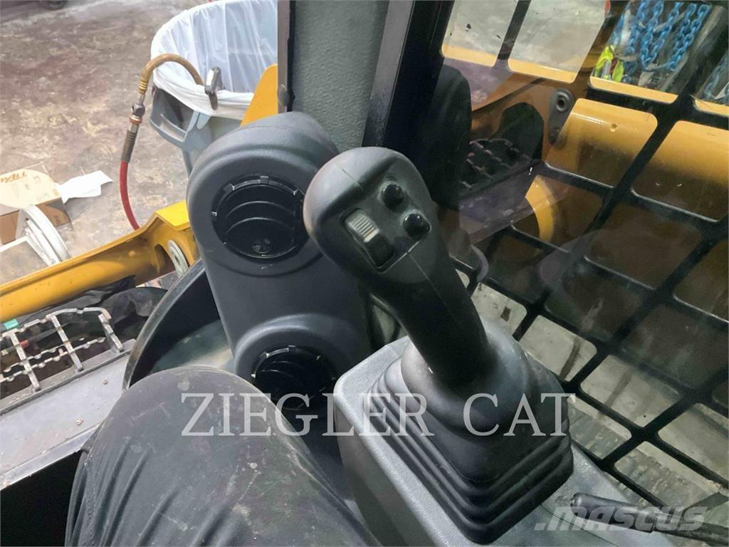 CAT 259D3 Гусеничные фронтальные погрузчики