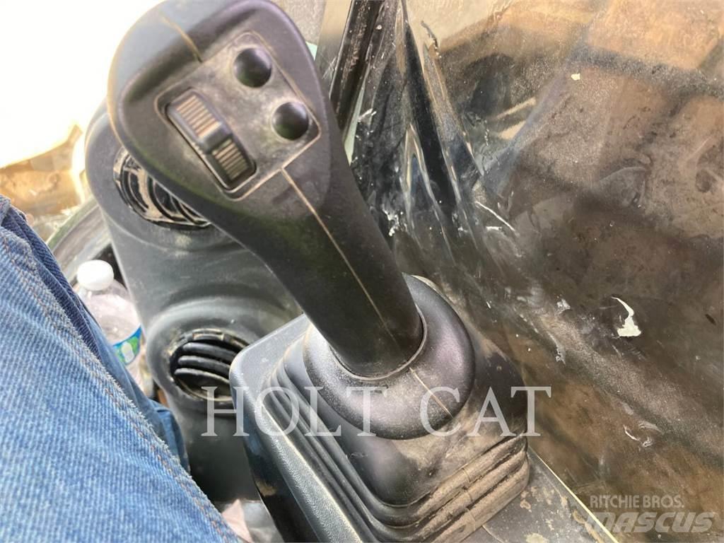 CAT 289D3 Гусеничные фронтальные погрузчики