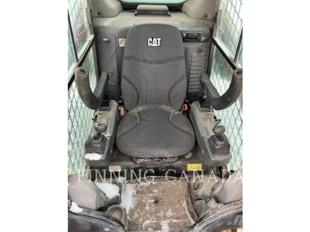 CAT 289D3 Гусеничные фронтальные погрузчики