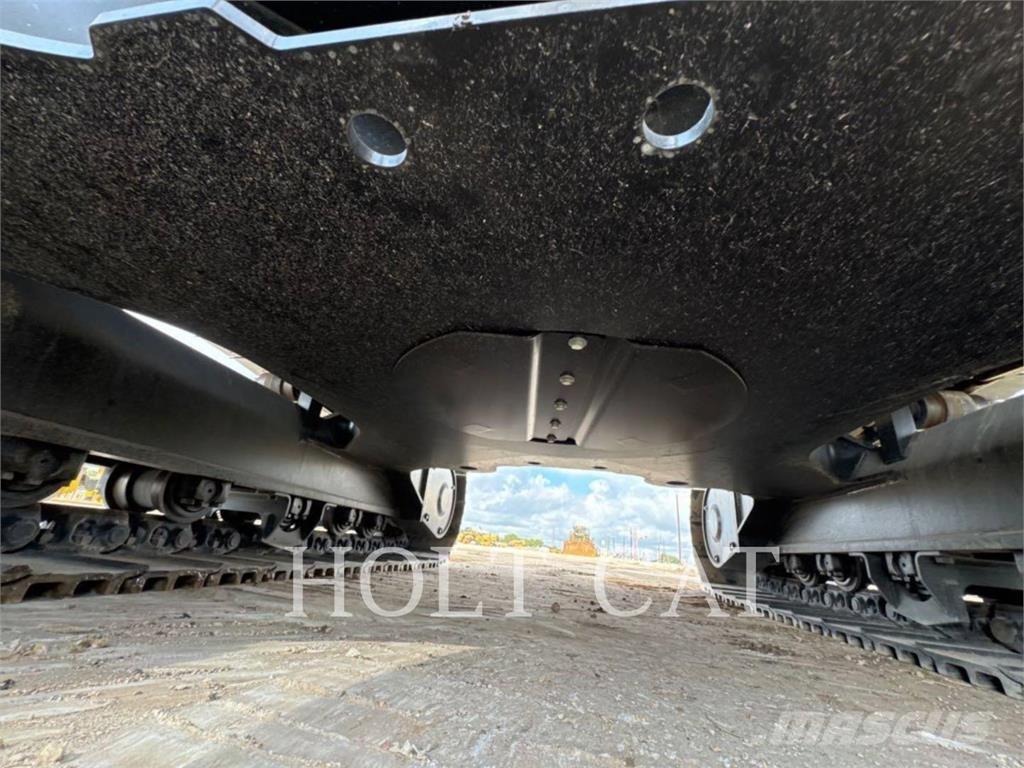 CAT 323 TC Фронтальные погрузчики