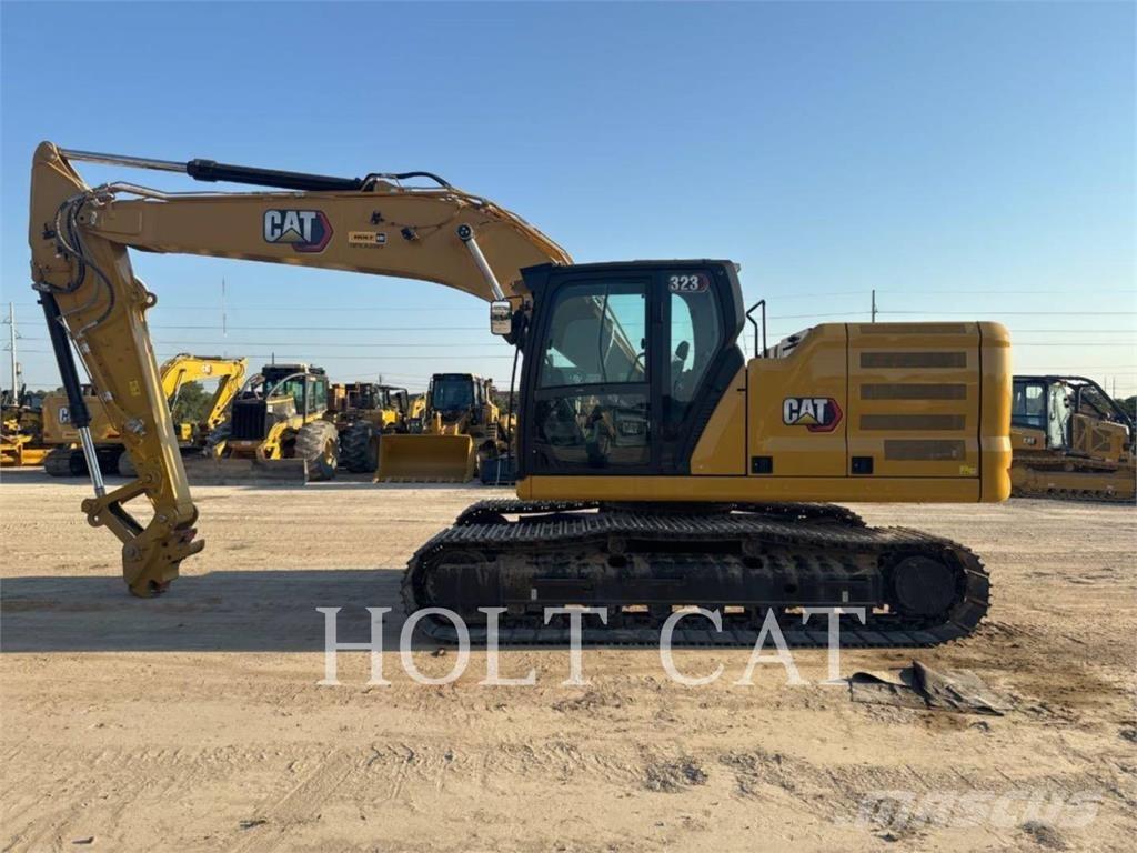 CAT 323 TC Фронтальные погрузчики