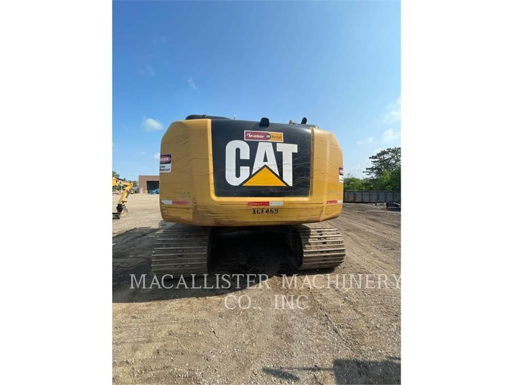 CAT 323FL Гусеничные экскаваторы
