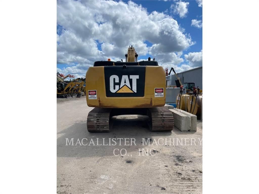 CAT 323FL Гусеничные экскаваторы