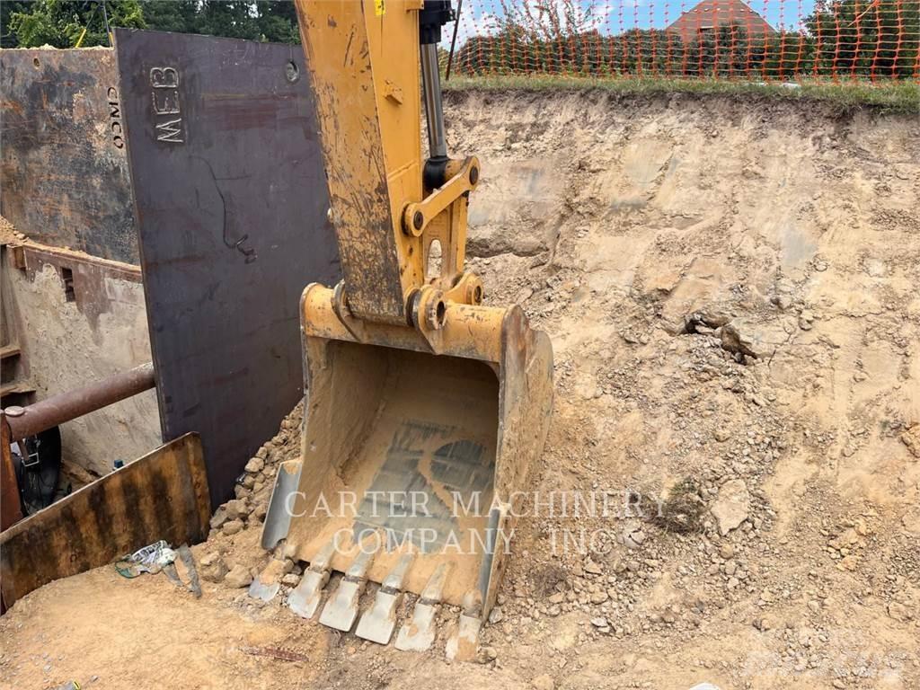 CAT 323FL Гусеничные экскаваторы