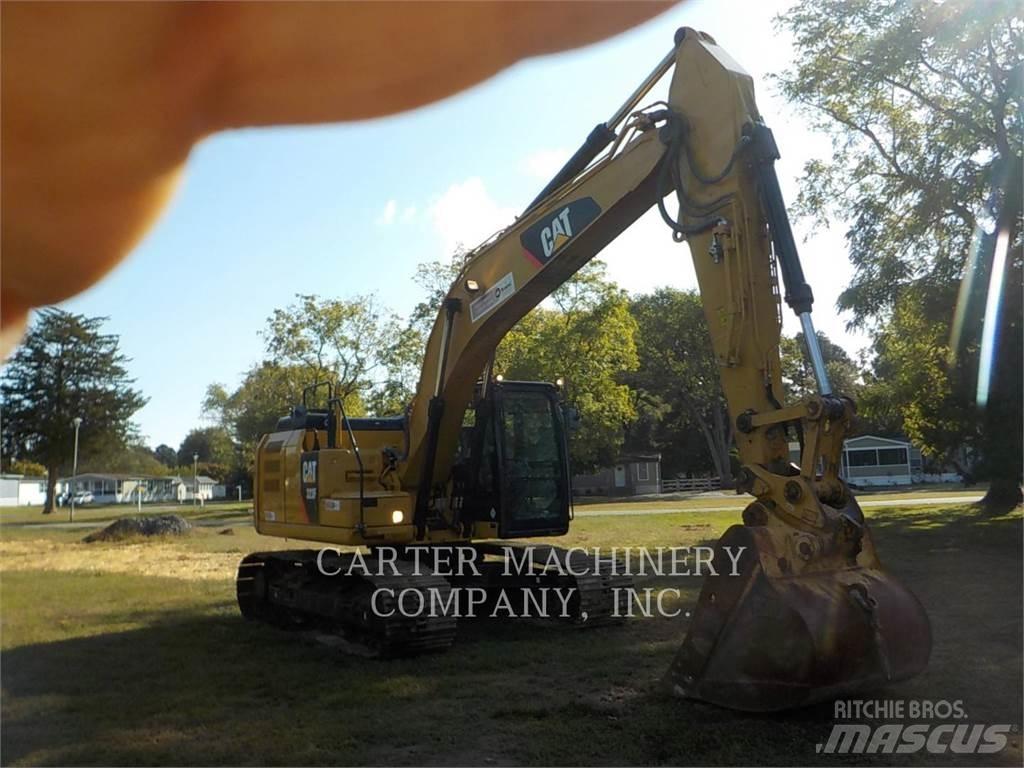 CAT 323FL Гусеничные экскаваторы
