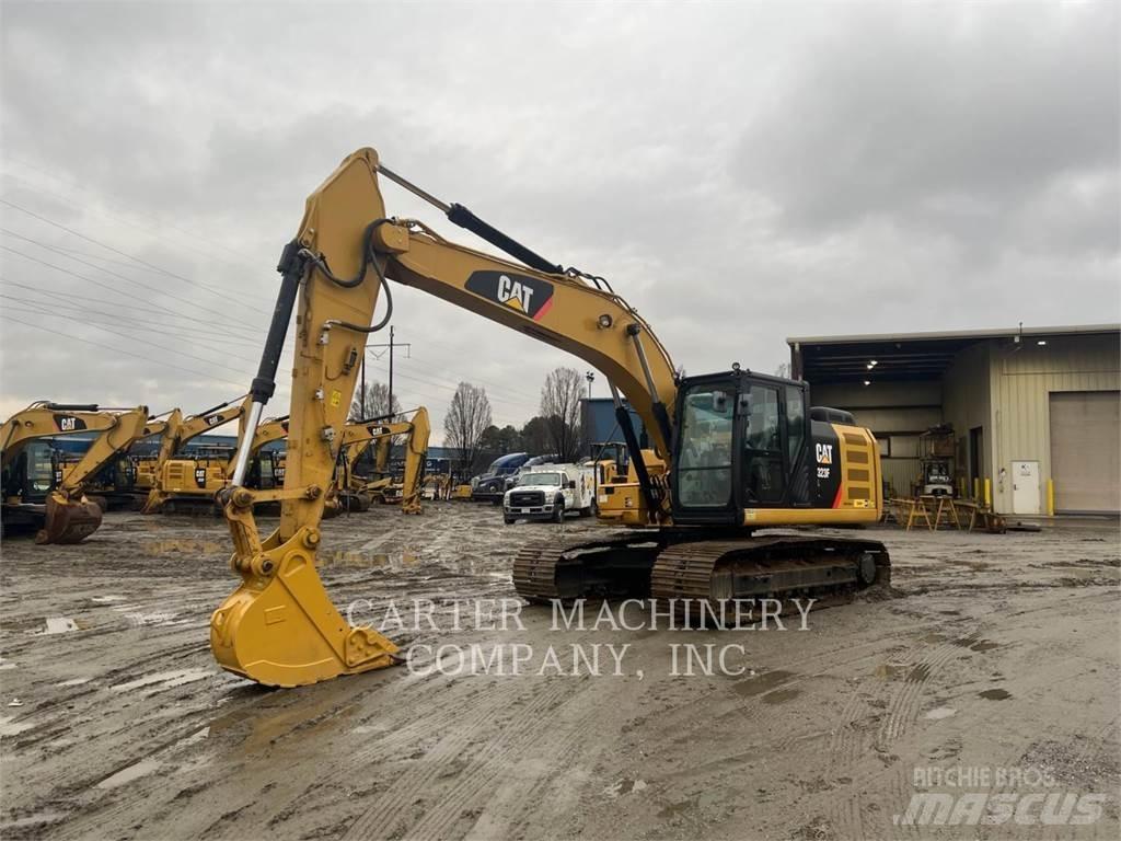 CAT 323FL Гусеничные экскаваторы