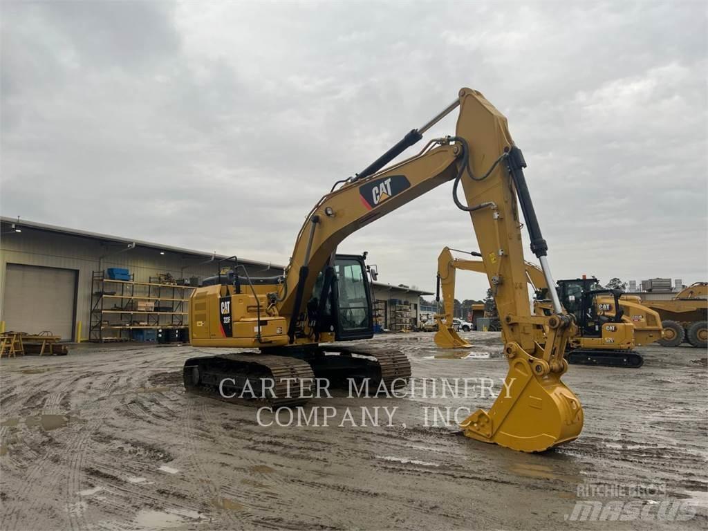 CAT 323FL Гусеничные экскаваторы