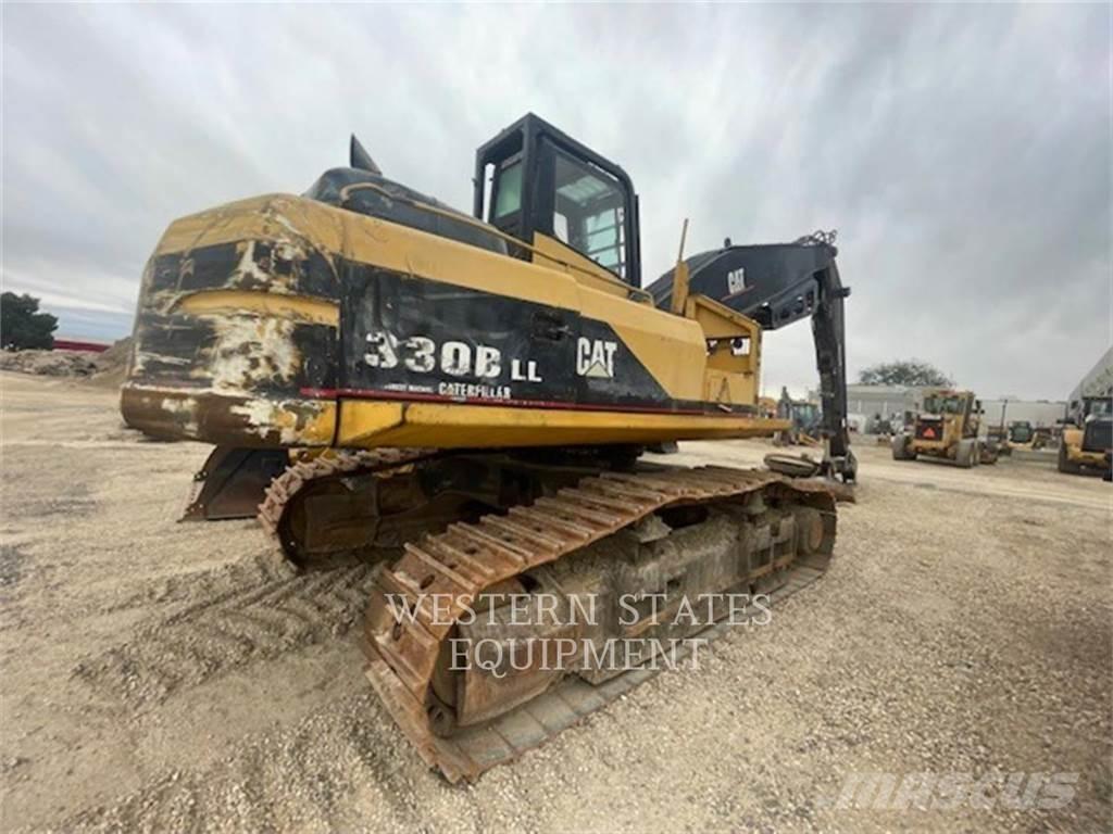 CAT 330B FM Лесохозяйственные тракторы