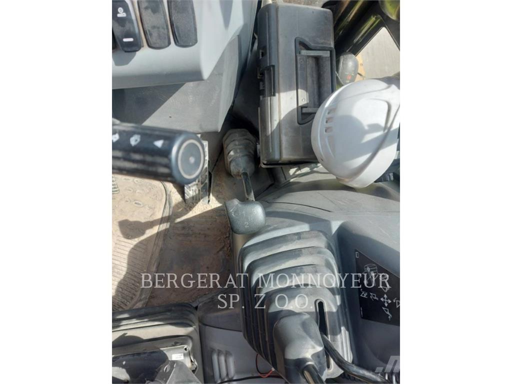 CAT 428 Экскаваторы-погрузчики