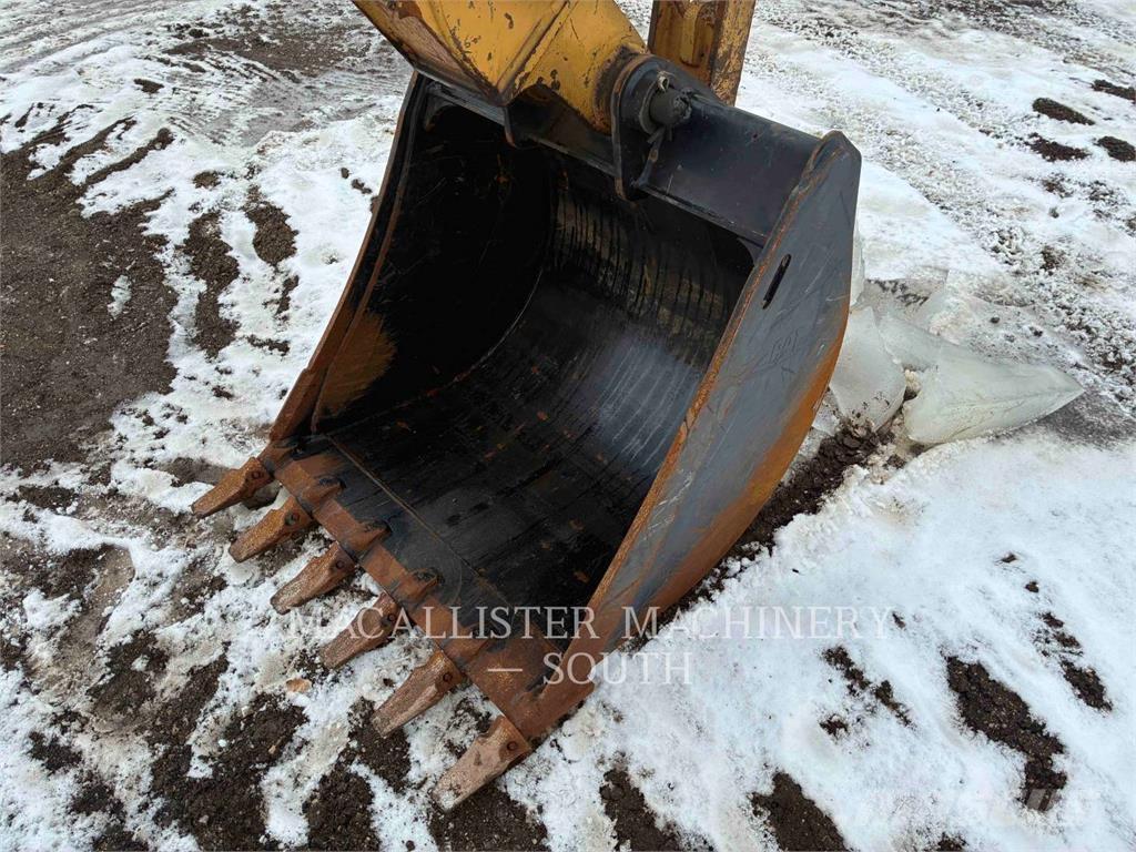 CAT 440 Экскаваторы-погрузчики