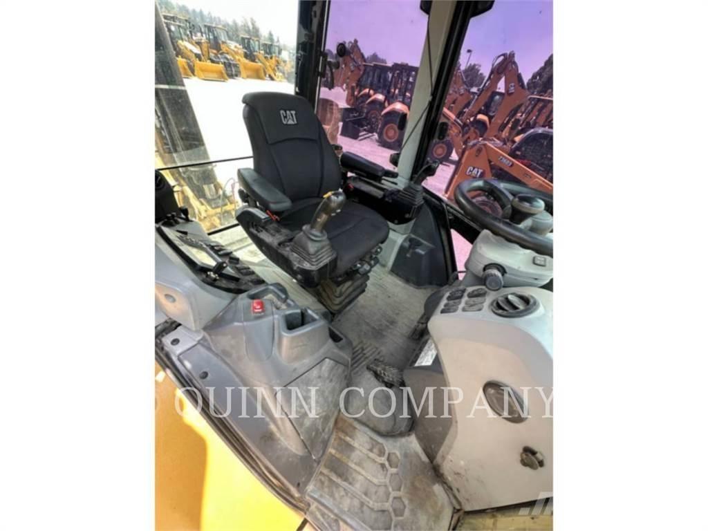 CAT 450 Экскаваторы-погрузчики