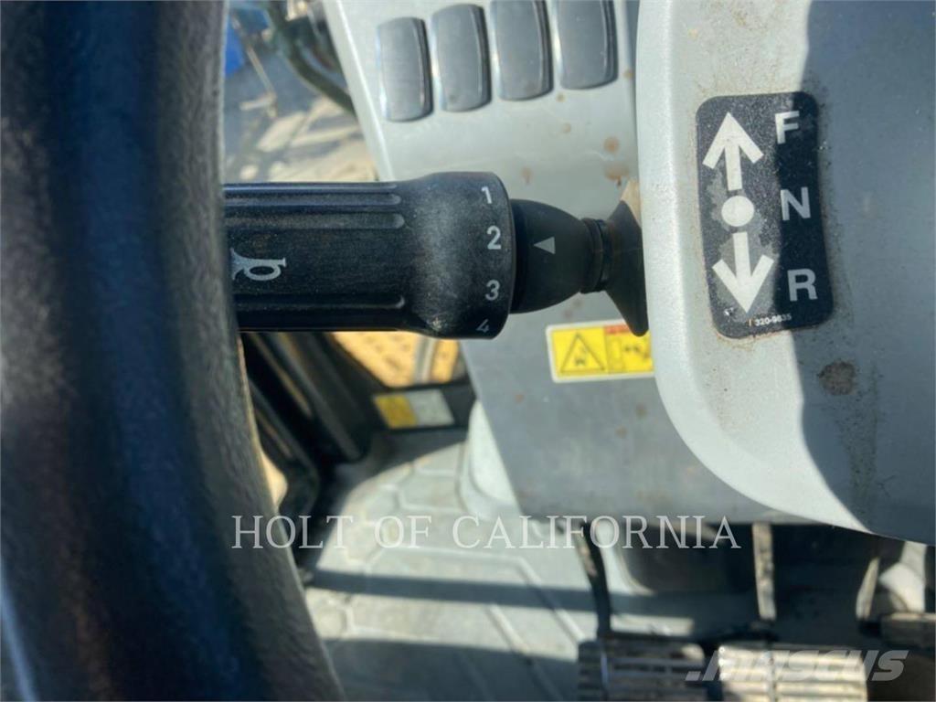 CAT 450 Экскаваторы-погрузчики