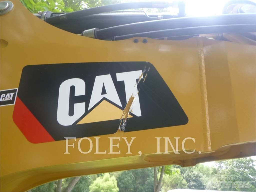 CAT 450-07 Экскаваторы-погрузчики