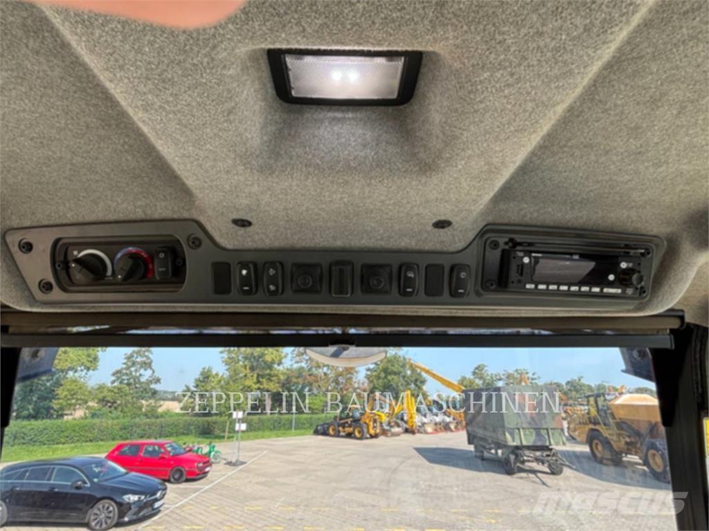 CAT 730-04A Шарнирно-сочленённые самосвалы